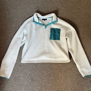 white and blue cropped pullover